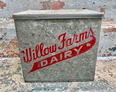 antique metal milk box|old metal milk container.